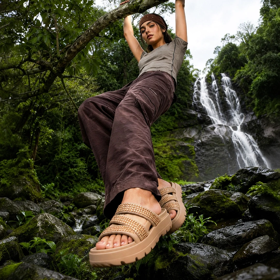 Woman wearing brown footwear